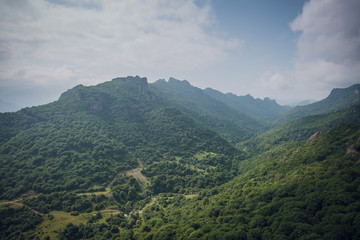 Obraz premium mountain green valley on a bright Sunny day