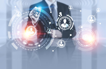 Businessman in office using people network hud