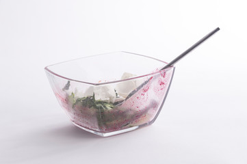 Dirty glass Cup with a spoon