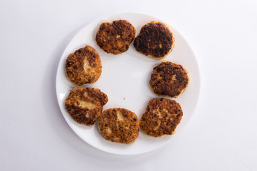 Fried cheesecake on a plate top view