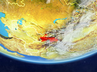 Obraz premium Tajikistan on realistic model of planet Earth with country borders and very detailed planet surface and clouds.