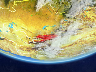 Kyrgyzstan on realistic model of planet Earth with country borders and very detailed planet surface and clouds.