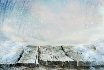 Winter design . Frozen wooden table with landscape