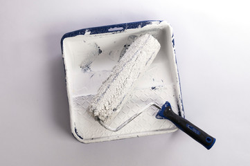 Blue tray with roller for paint