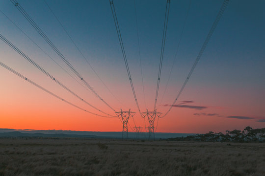Power lines at Sunset - Powered by Adobe