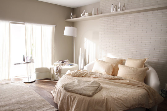 Round Bed In Beige Bedroom