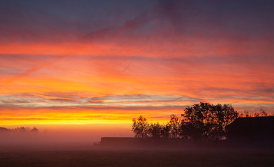 Fototapeta na wymiar Very colourful ,misty and moody sunrise
