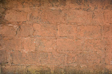 old brick red wall. Rough texture. Masonry