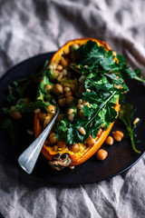 STUFFED SPAGHETTI SQUASH WITH CHICKPEAS and GARLICKY ARUGULA CREAM.selective focus