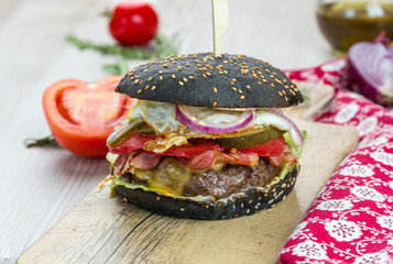 Black Burger XXL Marbled Beef Chicken, Iceberg Salad, Cheddar Cheese, Tomatoes, Cucumber, Bacon, Chicken Egg, Onion, Spicy Sauce