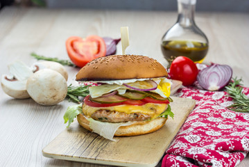 Hamburger Marbled Beef Chicken, Iceberg Salad, Cheddar Cheese, Tomatoes, Pickled Cucumbers, Onions, Barbecue Sauce