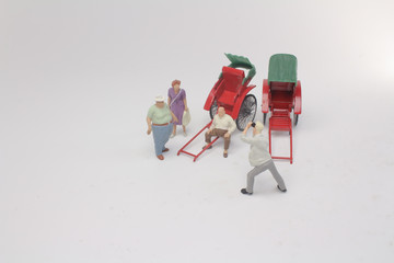 a Mini of vintage oriental rickshaw cab