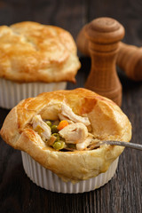 Chicken pot pie with carrot, grean peas and cheese.