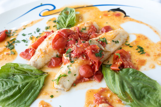Cod with tomato and basil