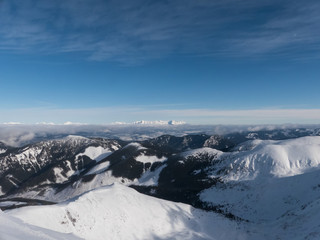 Snowy winter peaks in High Tatras from hill Chopok in Low Tatras mountains, Slovakia