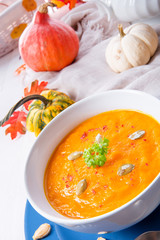 healthy pumpkin soup with ginger carrots and coconut milk
