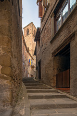 Fototapeta na wymiar Anghiari alley to the tower