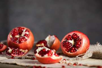 Pomegranate fruit on a wooden surface