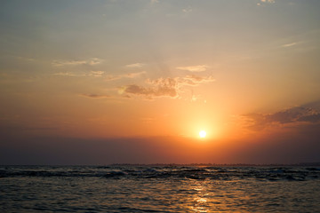 Obraz premium seascape with a magnificent sunset over the sea.