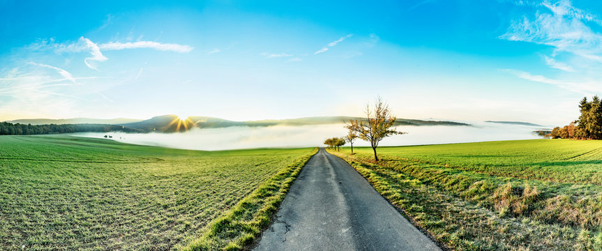 sunrise in the scenic hilly kandscape of the Taunus area in Hesse
