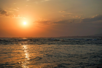 Obraz premium seascape with a magnificent sunset over the sea.