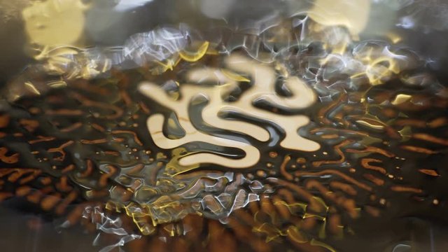 Ferrofluid. Beautiful colors and fantastic shapes. Close-up.