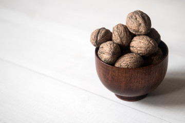 wallnuts in wooden bowl