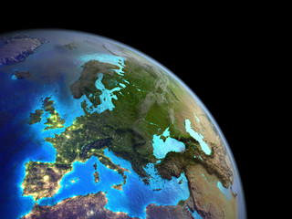 Europe on planet Earth from space. Very fine detail of textures with real plastic mountains and visible bright city lights.