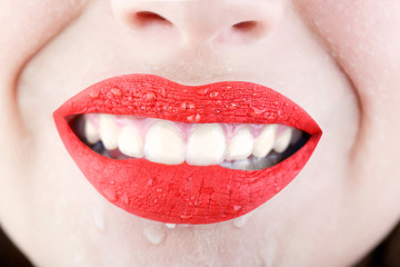 Sensual mouth, sexy lip, smile. Face skin mouth perfection flawless concept. Sexy lips. Red lip. Close up of sexy plump soft lips with red lipstick. Closeup, sexy mouth, sensual makeup, isolated.