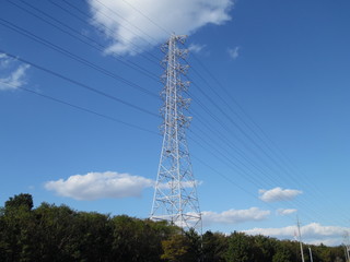 A Pillar of the power transmission line sticking in the sky