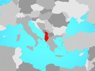 Albania on blue political globe.