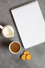 Cup of coffee with sweet mini cookies  on grey concrete background. Free space for text.