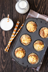 Fresh homemade muffins with cream cheese filling and streusel.