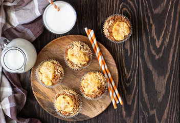 Fresh homemade muffins with cream cheese filling and streusel.