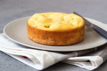 Corn cake with broccoli on parchment paper. 