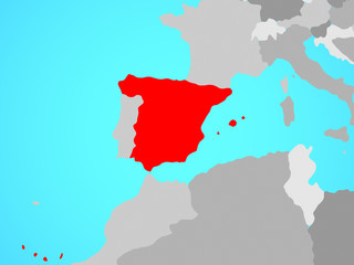 Spain on blue political globe.