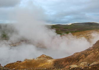 Steaming lake, hot pots in Geothermal active area Krýsuvík, Seltun, Global Geopark, Iceland, Europe