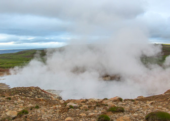 Fototapeta na wymiar Steaming lake, hot pots in Geothermal active area Krýsuvík, Seltun, Global Geopark, Iceland, Europe