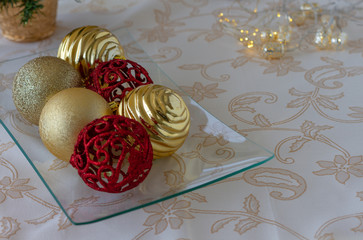 Christmas decorations . Close up golden and red shiny ball. Top view. Copy Space