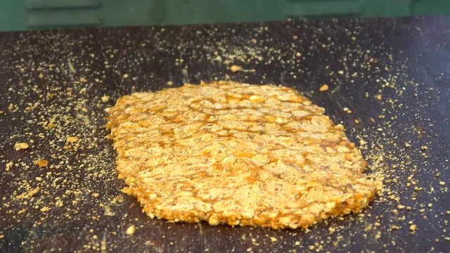 Preparing Chinese peanut snack