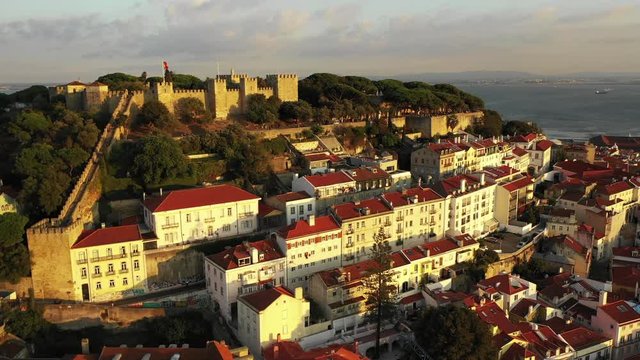 Aerial view of Lisbon with S&atilde;o Jorge Castle at sunset 1..