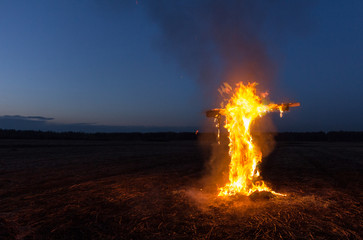 burning cross in the night