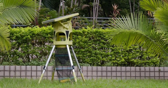 Solar energy mosquito catching machine in park