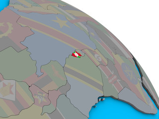 Burundi with embedded national flag on simple blue political 3D globe.