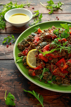 Lentil salad with roasted red pepper, zucchini and dry tomatoes, lemon. healthy food, vegetarian and vegan style