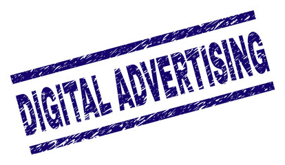 DIGITAL ADVERTISING seal print with grunge style. Blue vector rubber print of DIGITAL ADVERTISING title with grunge texture. Text tag is placed between parallel lines.