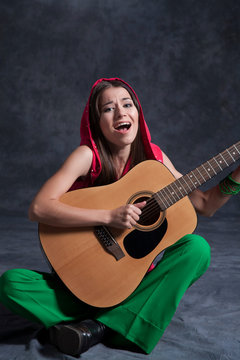 Girl playing guitar