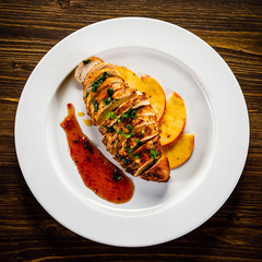 Grilled chicken fillet with apples