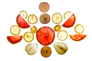 Composition of longitudinal and transverse cuts of fruits of various shapes on the lumen isolated on white background.