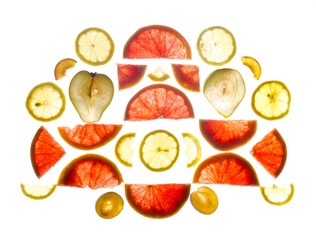 Composition of longitudinal and transverse cuts of fruits of various shapes on the lumen isolated on white background.